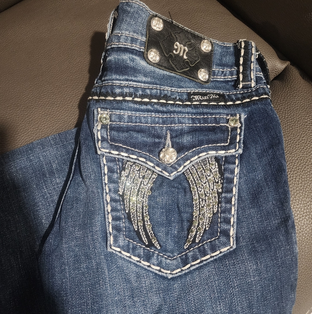 Miss Me Dark Blue Jeans with Silver Wings On Back Pockets.